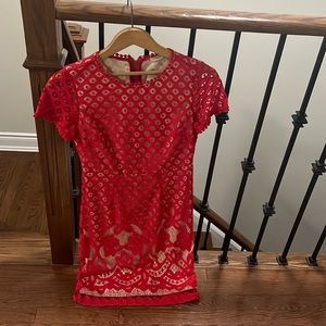 Red fancy cocktail dress, size Xs. Flattering fit. New tags still on.